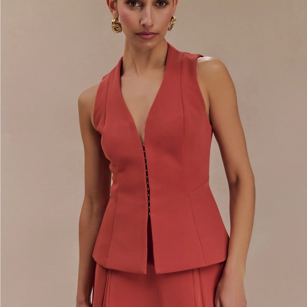 Meshki Coral Sleeveless Peplum Vest Melinda Structured Vest Top in Chilli